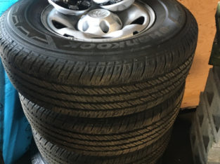 Brand new P245/75R16 tires and toyota rims