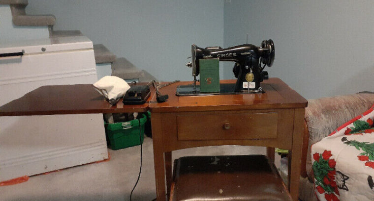 Singer 15-90 Sewing Machine in Table, Vintage. $219 (SURREY)