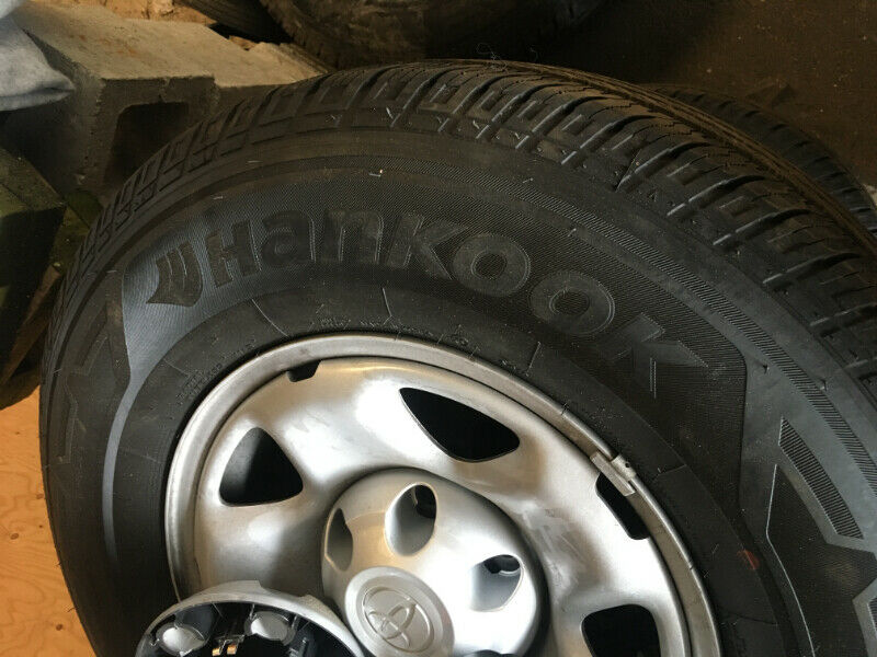 Brand new P245/75R16 tires and toyota rims