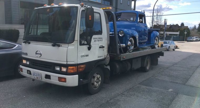 Towing flatbed tow truck and scrap car removal