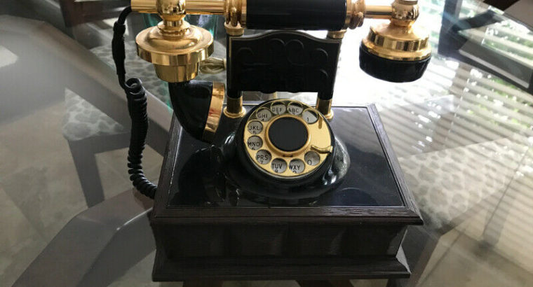 Old rotary dial cradle phone