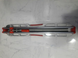 Like new Rubi 24″ tile cutter with two replacement blades