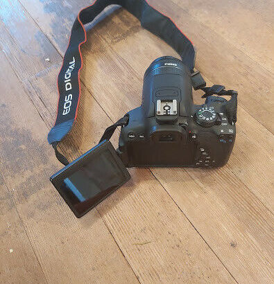 Canon Rebel T5i 18MP DSLR Camera + EF-S 18-55mm IS Lens