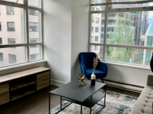 Furnished Corner Unit in a Prime Downtown Location