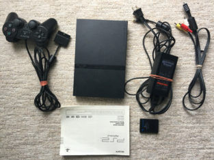 PlayStation 2 slim console with 6 games