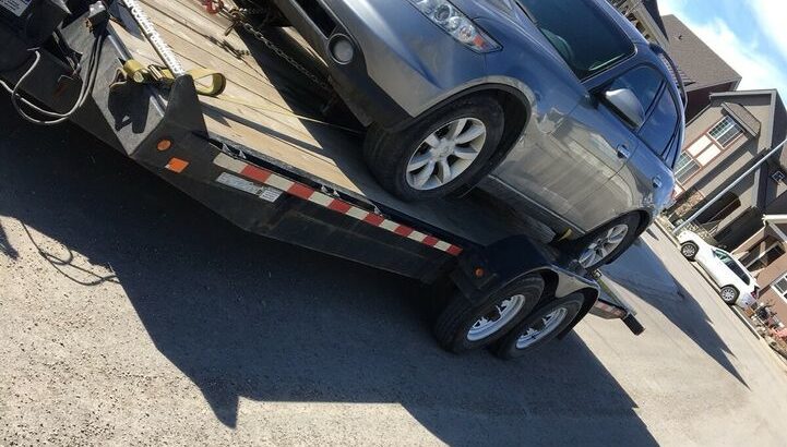 Tow truck long distance from Calgary to BC this week