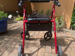Used Hugo walker with seat and storage in excellent condition!
