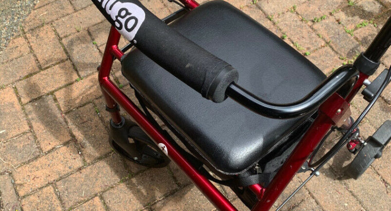 Used Hugo walker with seat and storage in excellent condition!