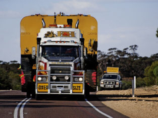 Heavy equipment trucking across Canada