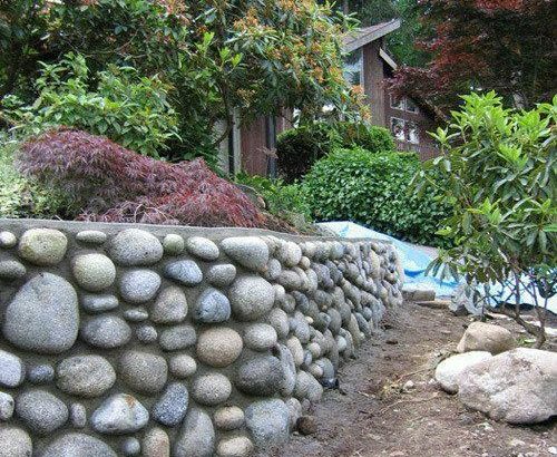 Rock wall and concrete repairs softscaping topsoil bark mulch