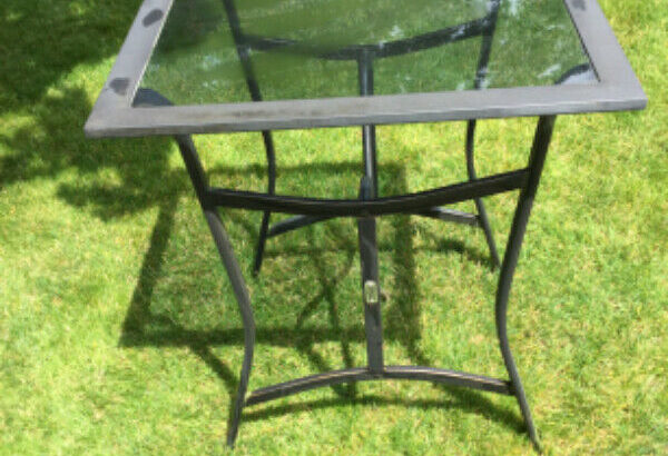 Glass top patio table