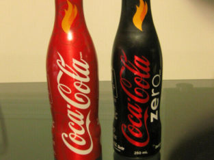 Unopened 2010 Olympic Coca Cola bottles