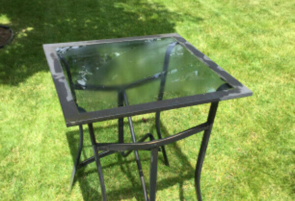 Glass top patio table