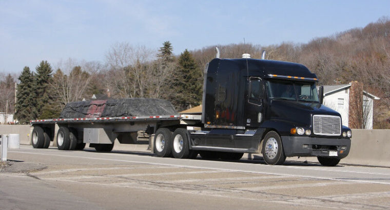 Heavy equipment & farm equipment hauling shipping in Canada