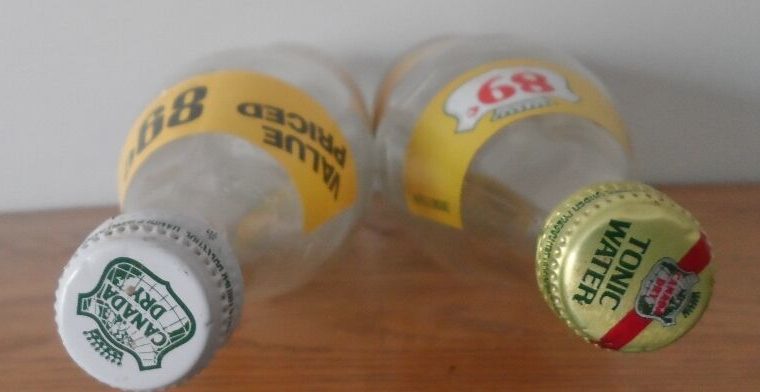 2- vintage Canada Dry Tonic Water 750 ml bottles /foil labels