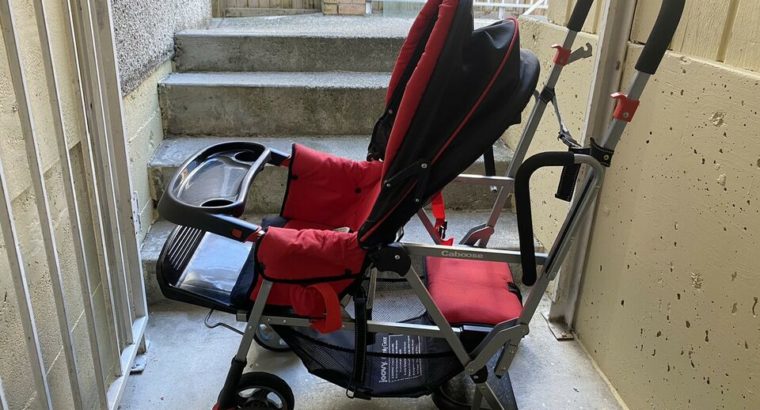 Joovy caboose sit and stand double stroller .