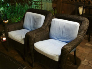 Outdoor Furniture: Gluckstein Wicker Chairs (4) and Tables (2)